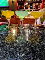 Peach Lime and Mango Margarita on the Rocks